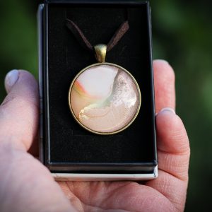 Pirkadat- antikolt bronz medálban